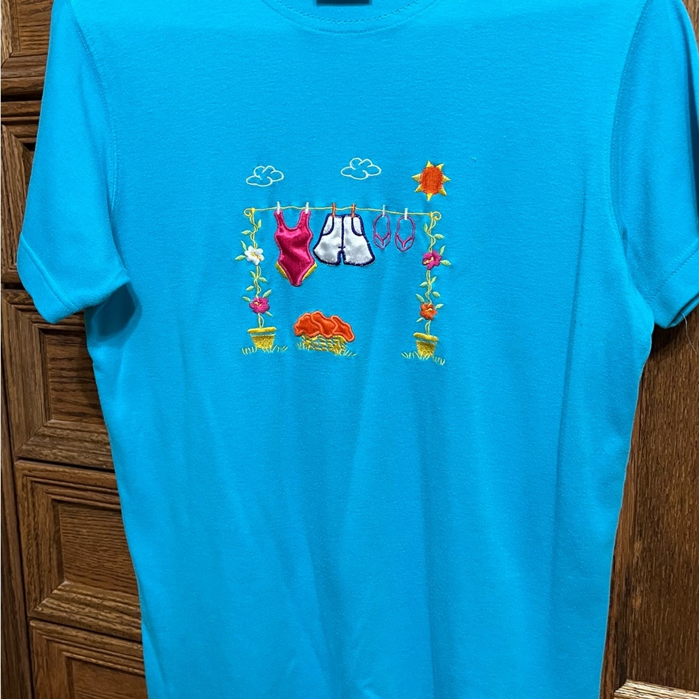 Baxter and Wells sport, no size tag but fits like a medium/large, blue top